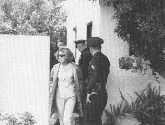 Pat leaving Marilyn's home the morning after her death
