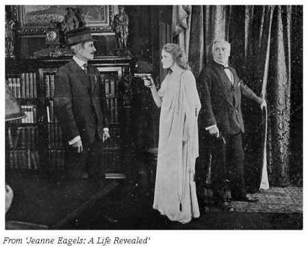 A gun-toting Eagels defends Frederick Warde (right) in 'Under False Colors' (1917)